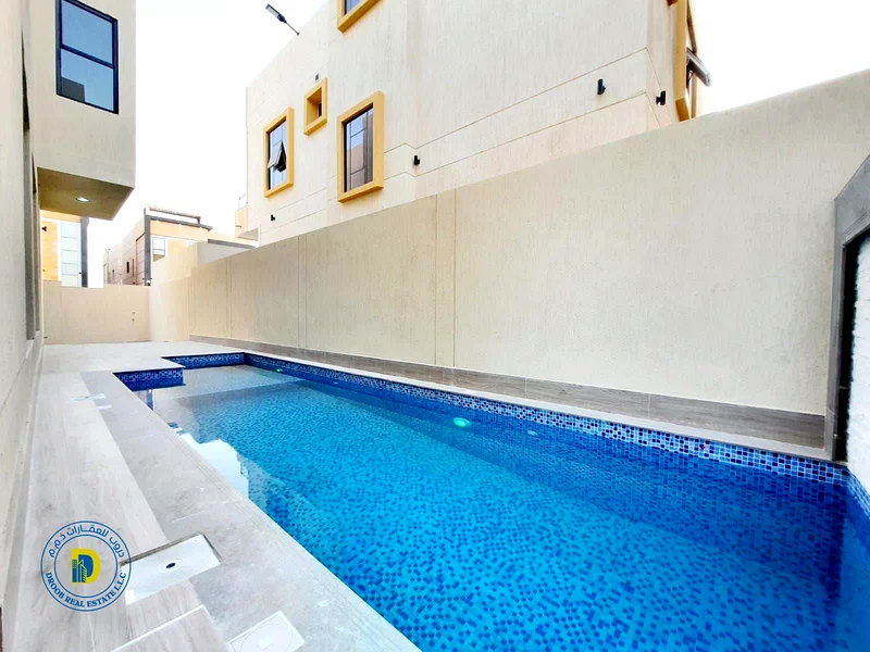 For luxury lovers, a 5-room villa with pool and a roof, including electricity and AC, in Al Yasmeen , bank financing, freehold63895953671426111
