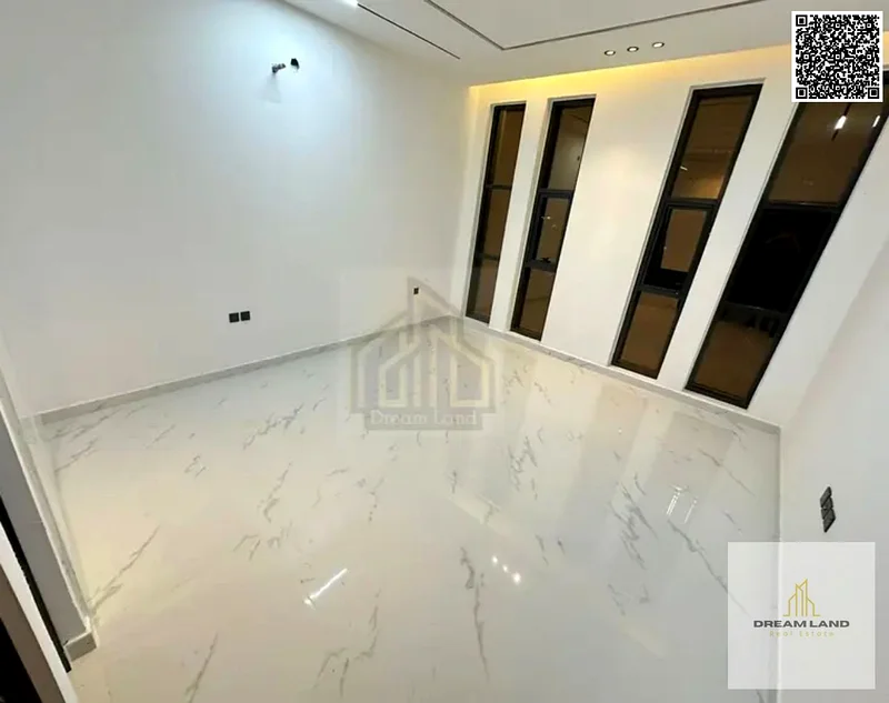 For sale, a villa consisting of 4 master bedrooms, a living room, and 2 halls, including registration fees, in Ajman, Al Helio 2 area63891458485379114
