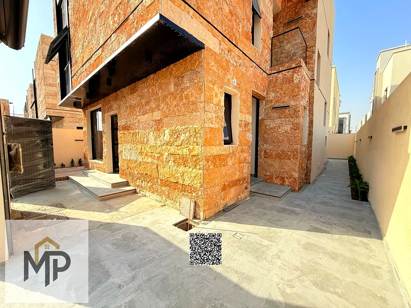 Villa for sale in Al Bahia - elegant design and prime location, price includes registration fees, close to all services63880279618305113