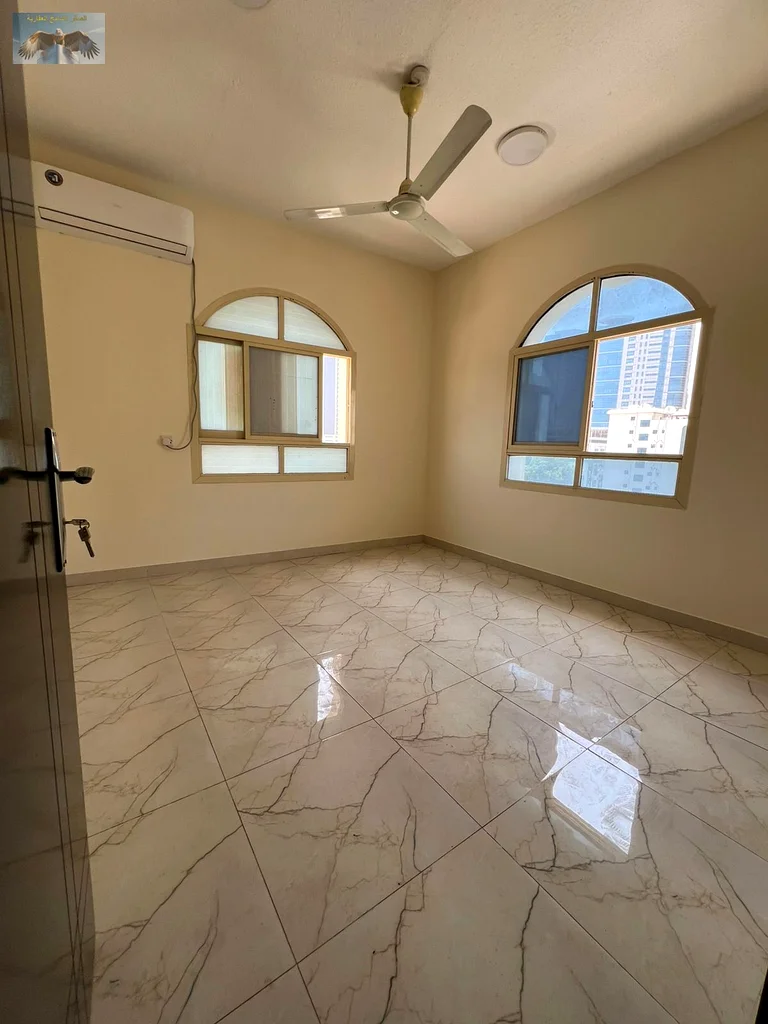 A distinctive apartment for rent in Al Rashidiya 3, a vital location ideal for families, close to services and main roads, at an attractive price and63721700964611113