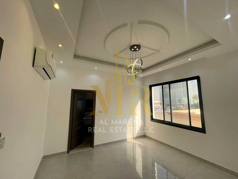 For sale in Harba, Ajman, a luxurious villa in Rawda 2, cash only, including electricity, water, and air conditioning. 5 master bedrooms with a majlis63879536652033113