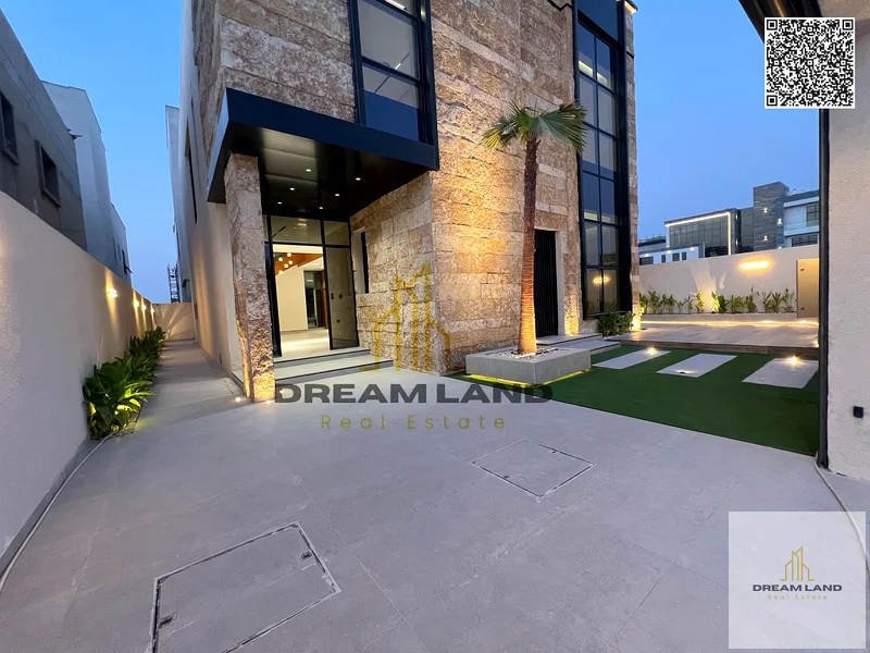 Villa - Two floors & large courtyard including fees - Close to Sheikh Mohammed bin Zayed Road - Freehold for all nationalities for life - With the pos63877480413313111