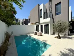 Ready-to-move-in villa in a prime location with a private pool and 2 spacious kitchens, partially fu