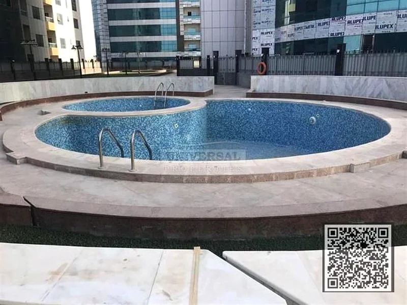 صفقة ممتازة...شقة فارغة جميلة بغرفة نوم واحدة مع موقف سيارات في برج أورينت عجمان63868943700098114