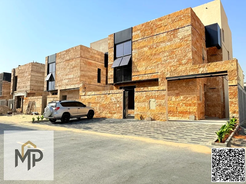 Villa for sale - two floors and a large courtyard - close to Sheikh Mohammed bin Zayed Road - freehold for all nationalities for life -63880618977155112