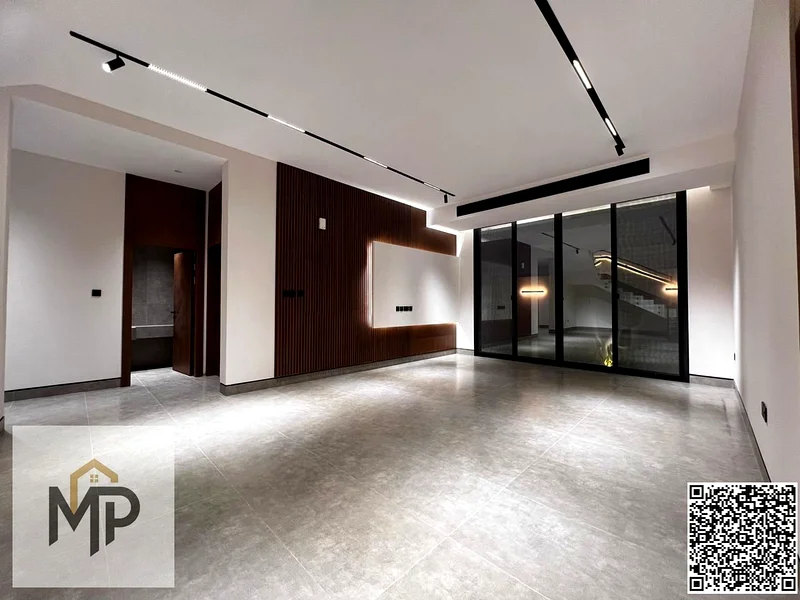 Villa for sale - two floors and a large courtyard - close to Sheikh Mohammed bin Zayed Road - freehold for all nationalities for life -63880618977155114
