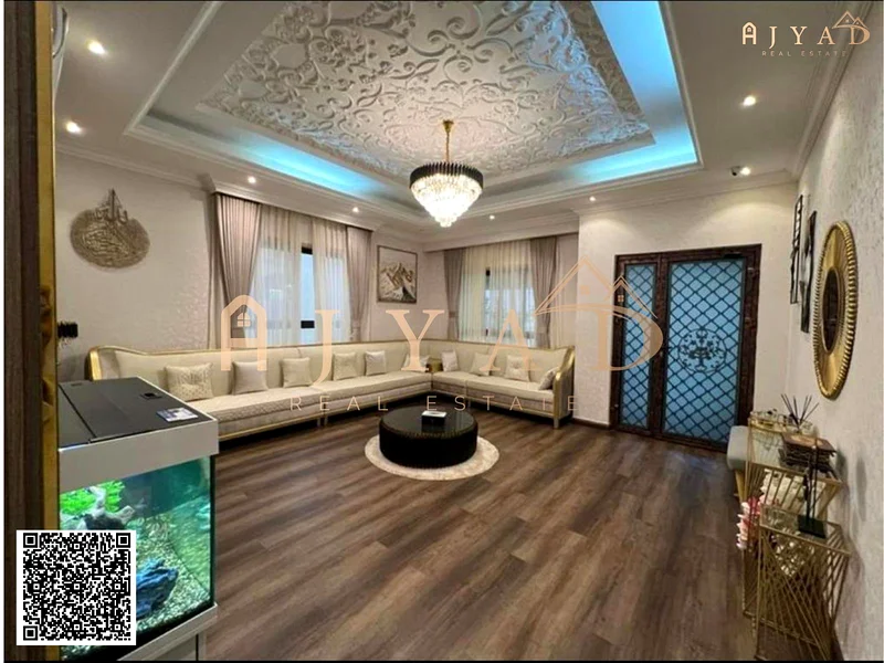 فيلا ركنية أنيقة مع مسبح خاص وحديقة وتشطيبات فاخرة | الروضة 3، عجمان63879425110401114