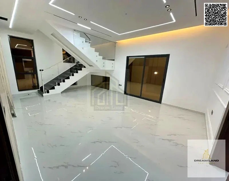 For sale, a villa consisting of 4 master bedrooms, a living room, and 2 halls, including registration fees, in Ajman, Al Helio 2 area63891458503425113
