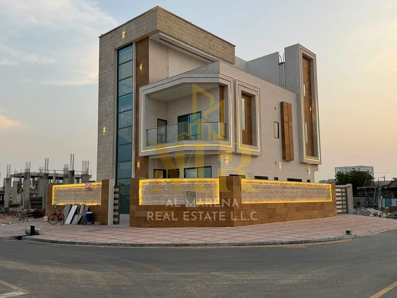 🏡 For Sale – Luxury Corner Villa in Al Helio – Ajman | 5 Master Bedrooms | Majlis & Two Living Rooms | 3 Modern Kitchens | Two Floors + Roof Terrace63896068384129111