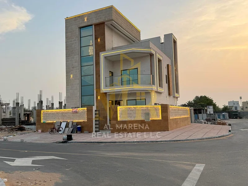 🏡 For Sale – Luxury Corner Villa in Al Helio – Ajman | 5 Master Bedrooms | Majlis & Two Living Rooms | 3 Modern Kitchens | Two Floors + Roof Terrace63896068384129113