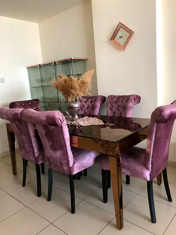 Glass bronze/gold dining table for sale with side