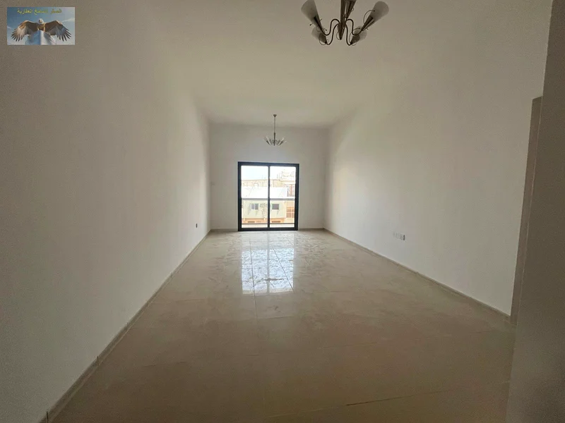 1BR & hall apartment for rent in Al Rawda 3, Ajman, first-time occupancy, 2 bathrooms, 2 spacious balconies, equipped with split AC, near Emirates Bea63719604294275111