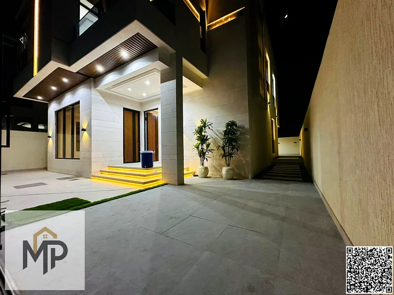 For sale, a modern villa, including registration fees, close to the mosque and services, with a seating area in the courtyard, with no down payment.63896181585409113