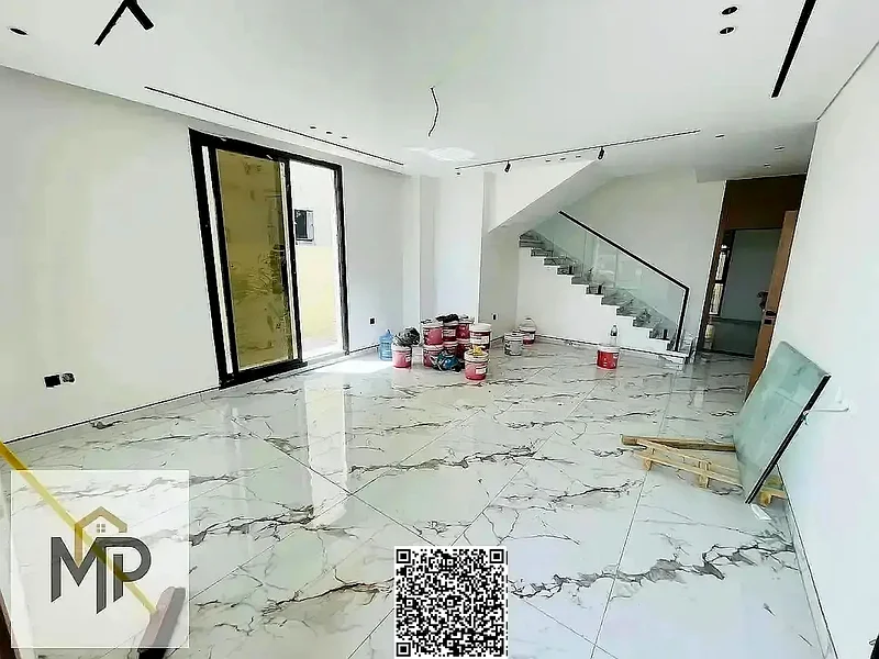 For sale - a luxurious villa in Al Bahia, Ajman, in a prime location close to all services. Price includes registration fees.63880279672962113