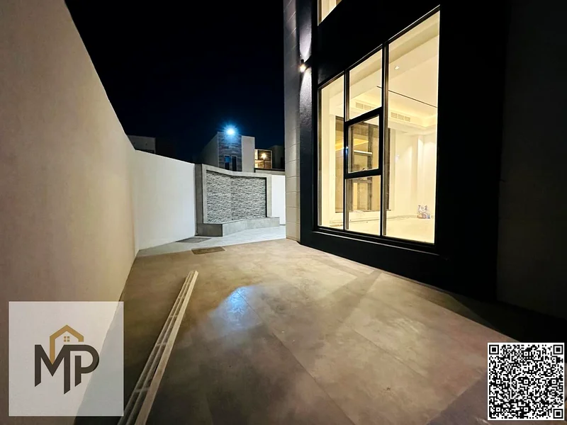 Villa for sale - two floors and a large courtyard - close to Sheikh Mohammed bin Zayed Road - freehold for all nationalities for life63880619884035112