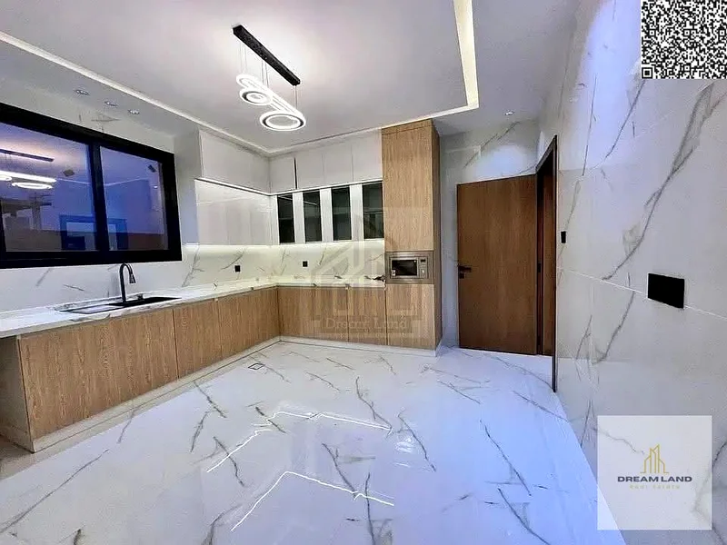 For sale - a luxury villa with a swimming pool in a prime location in Ajman, high-end finishing, modern design, including registration and owners63896068299522111
