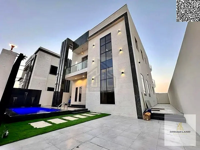 For sale - a luxury villa with a swimming pool in a prime location in Ajman, high-end finishing, modern design, including registration and owners63896068299522110