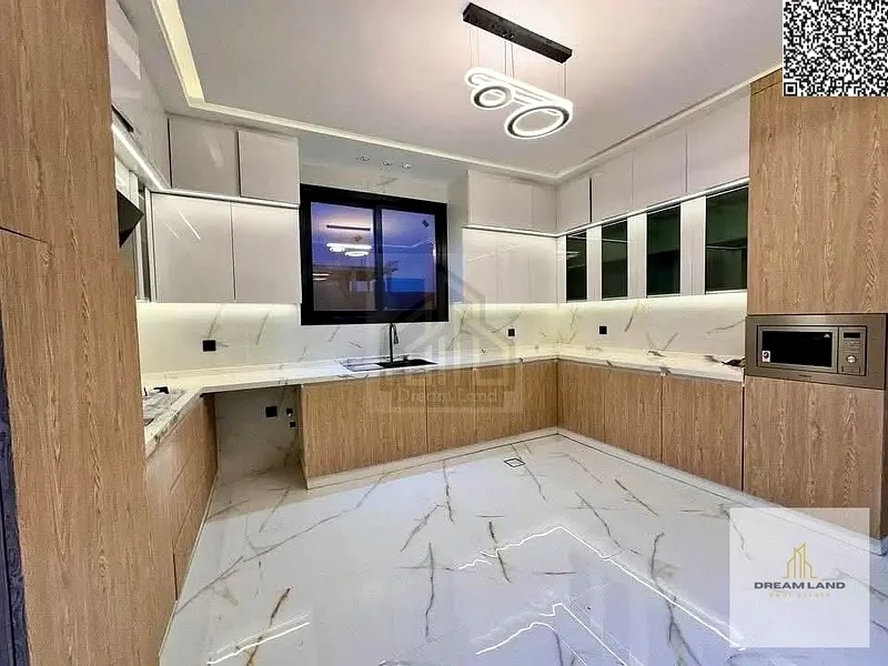 For sale - a luxury villa with a swimming pool in a prime location in Ajman, high-end finishing, modern design, including registration and owners63896068299522114