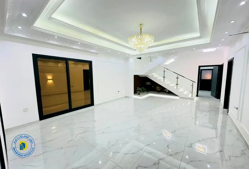 For sale, a classic 4-room villa, including registration fees, in the Al Helio 2 area, Ajman ,Bank financing, Freehold .63896859862017114