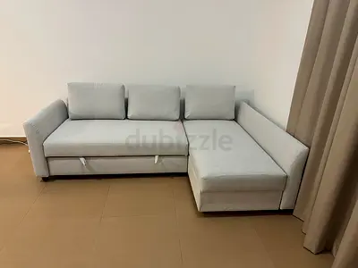 IKEA Holmsund l shape sofa com bed with storage