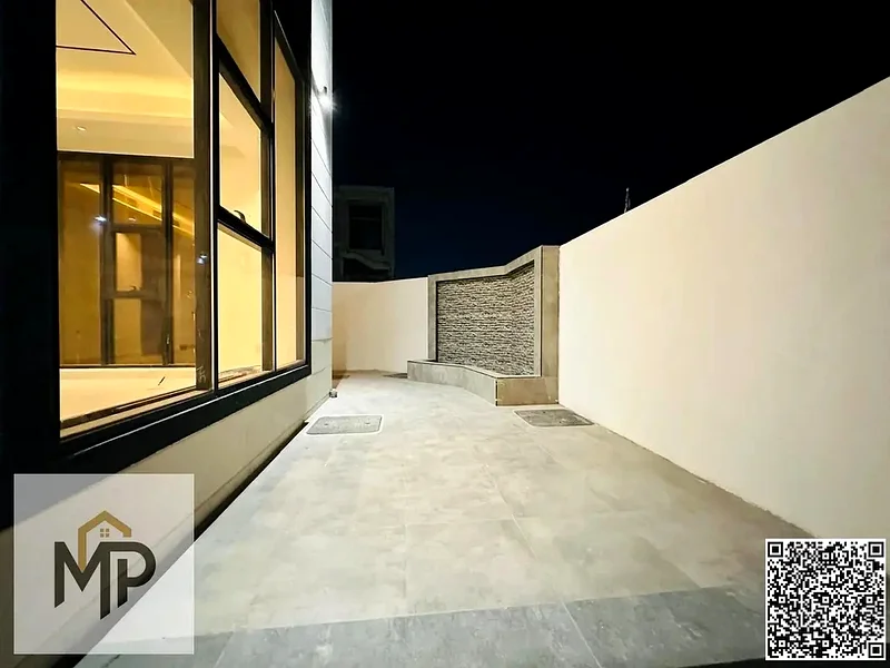 Villa for sale - two floors and a large courtyard - close to Sheikh Mohammed bin Zayed Road - freehold for all nationalities for life63880388991491114