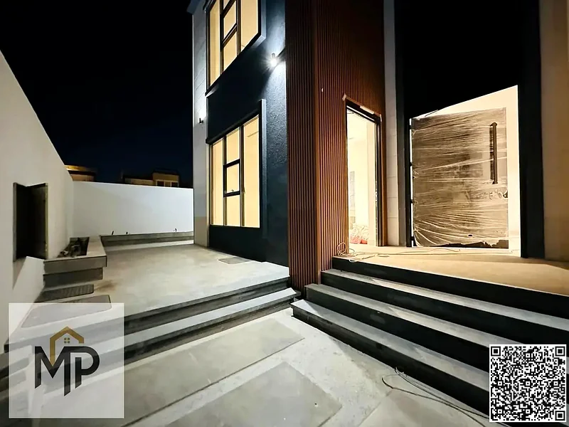 Villa for sale - two floors and a large courtyard - close to Sheikh Mohammed bin Zayed Road - freehold for all nationalities for life63880388991491113