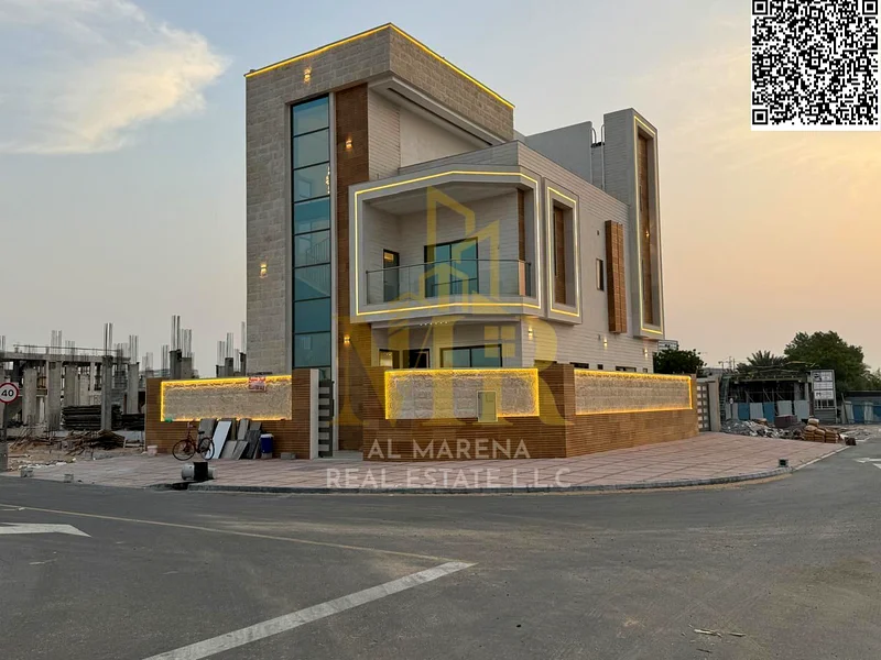 For sale in Al Harba, Ajman, all nationalities, a luxurious corner villa, the first resident in Al Helio 2, including registration and ownership fees,63896181648001114