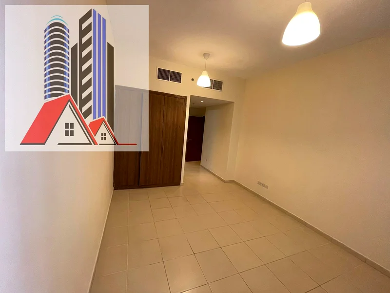 شقة من غرفتي نوم للبيع في برج عجمان وان مع موقف سيارات.63867571248515112