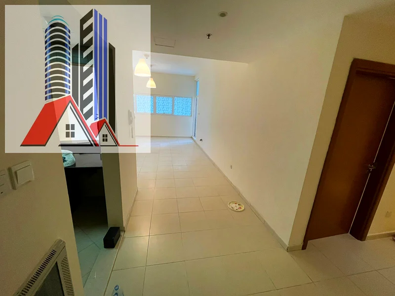 شقة من غرفتي نوم للبيع في برج عجمان وان مع موقف سيارات.63867571248515110