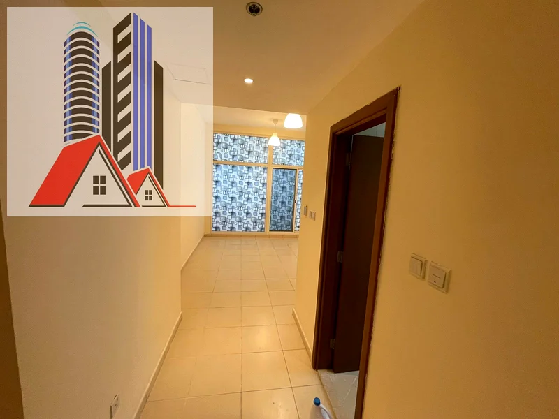شقة من غرفتي نوم للبيع في برج عجمان وان مع موقف سيارات.63867571248515114