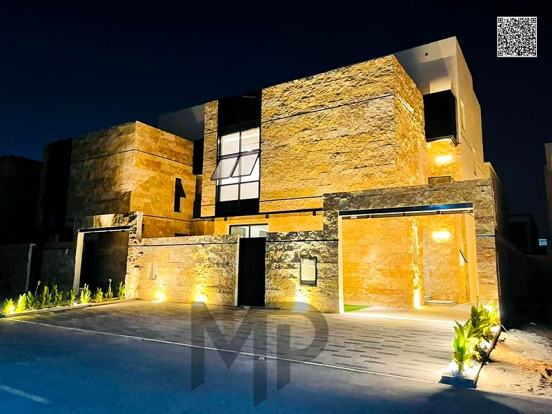 Villa for sale - two floors and a large courtyard - close to Sheikh Mohammed bin Zayed Road - freehold for all nationalities for life -63880619864195110