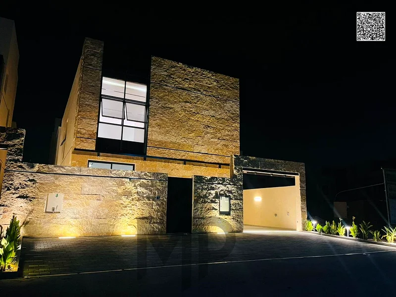 Villa for sale - two floors and a large courtyard - close to Sheikh Mohammed bin Zayed Road - freehold for all nationalities for life -63880619864195111
