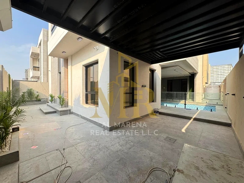 🏡 For Sale – Luxury Villa in Al Bahia – Ajman | 6 Master Bedrooms | Majlis & Hall with Wash Basins | Modern Kitchen | Private Swimming Pool | Two Flo63880619875202114