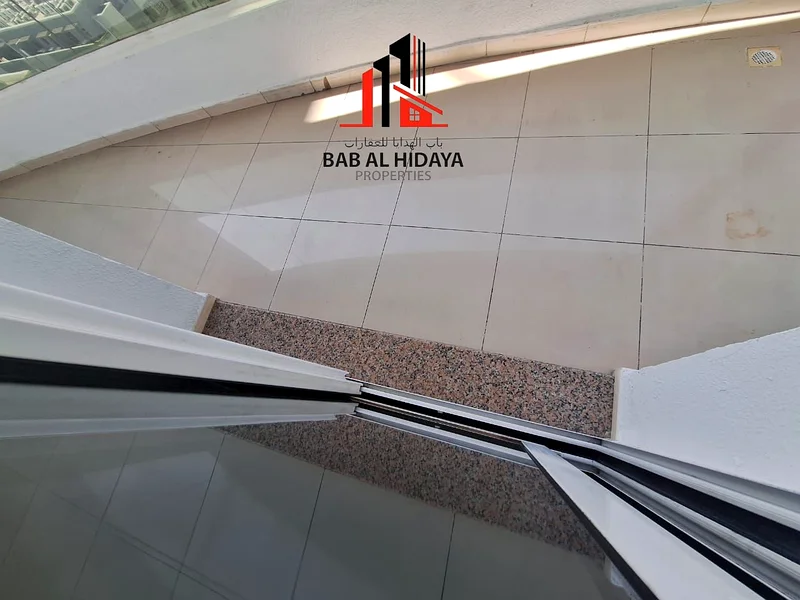 شقة مكونة من غرفتي نوم قرب الحديقة مع حمامين داخليين وجميع وسائل الراحة63757382394755113