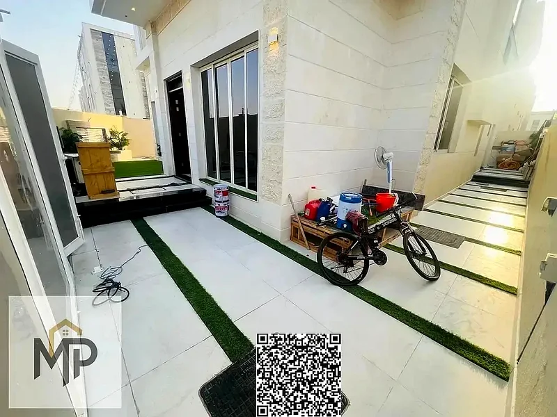 For sale - luxurious corner villa with stone finish and two facades | Elegant design and prime location in Ajman, including registration fees63871901470723112