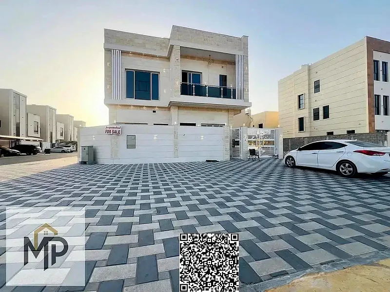 For sale - luxurious corner villa with stone finish and two facades | Elegant design and prime location in Ajman, including registration fees63871901470723111