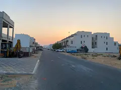 Own a townhouse plot in Al Helio 1 area , freehold for all nationalities