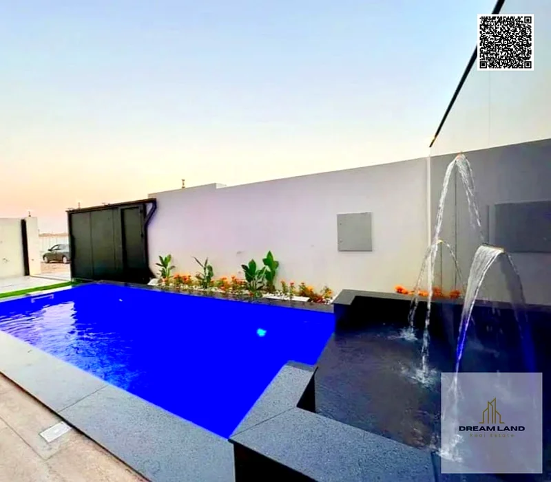 For sale - a luxury villa with a swimming pool in a prime location in Ajman, high-end finishing, modern design, including registration63898224509059110