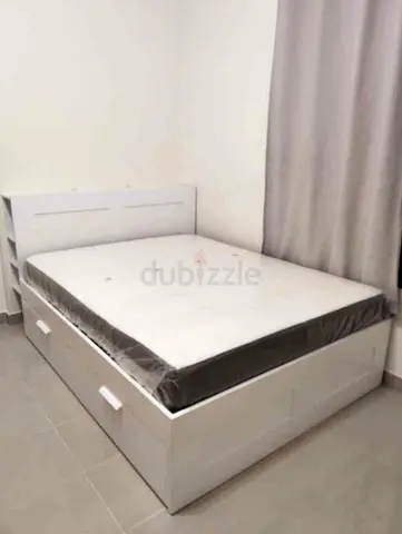 IKEA brimness queen size bed with 4 storage drawers underneath and with  IKEA mattress