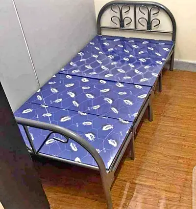Blue colour foldable bed for sale brand new