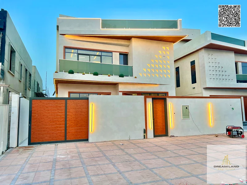 A villa at a price including registration and ownership fees on the main street, ready for occupancy in the most upscale areas of Ajman, freehold for63898224334209111