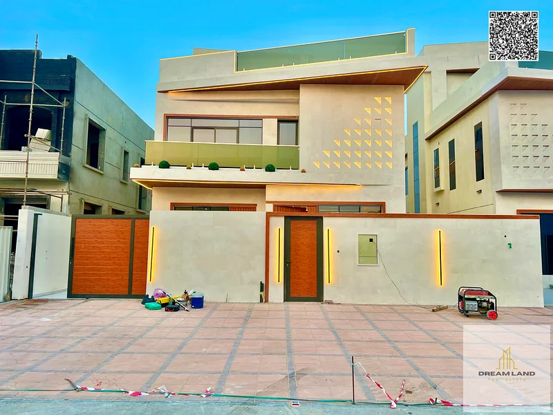 A villa at a price including registration and ownership fees on the main street, ready for occupancy in the most upscale areas of Ajman, freehold for63898224334209110