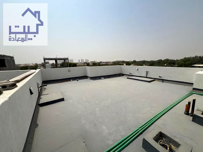A new luxury villa in Al Helio 2 - with high-end specifications and a modern design, including registration and ownership fees, two floors and a roof63898332493955114