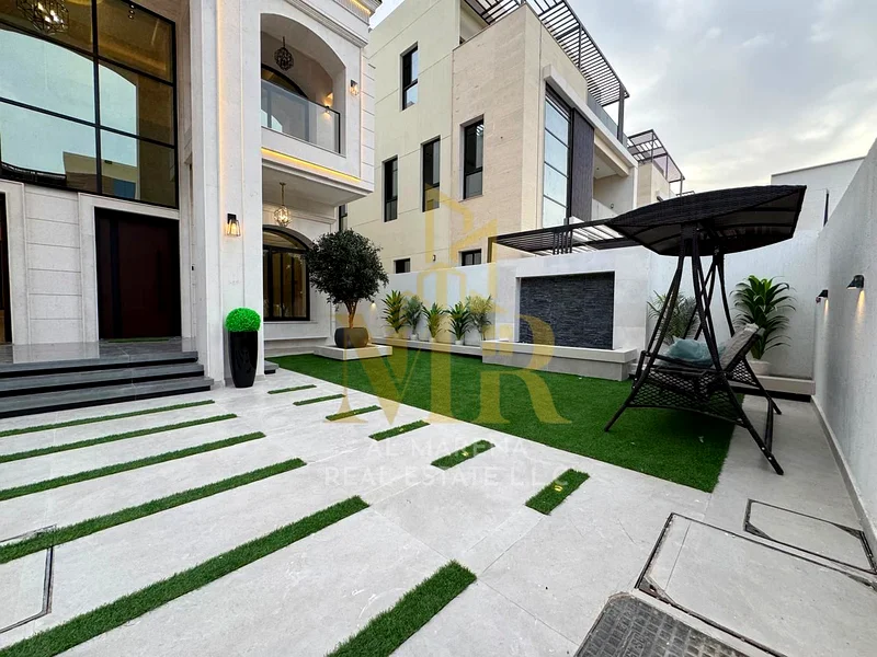 The most luxurious villas for sale with a classic design, featuring a large garden and a roof. It has 5 master bedrooms on an area of 4,225 sq ft, wit63880618857730114