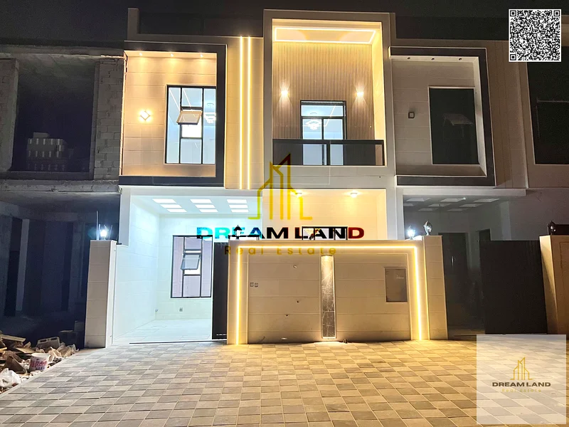 Luxury villa for sale in Al Helio 2 - Ajman | At an attractive price | 5 master bedrooms | Two-story design with a distinctive roof. Own now the villa63896736597506110