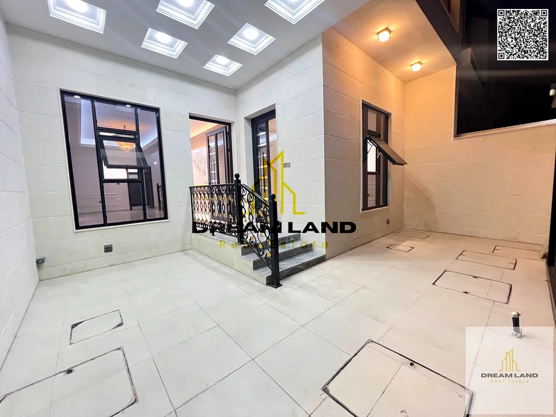 Luxury villa for sale in Al Helio 2 - Ajman | At an attractive price | 5 master bedrooms | Two-story design with a distinctive roof. Own now the villa63896736597506113