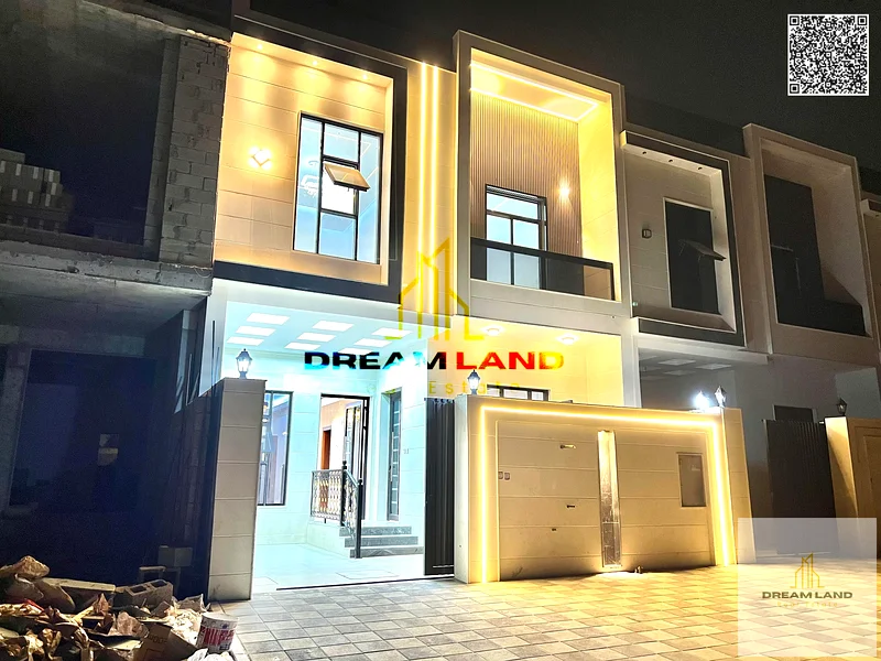Luxury villa for sale in Al Helio 2 - Ajman | At an attractive price | 5 master bedrooms | Two-story design with a distinctive roof. Own now the villa63896736597506111