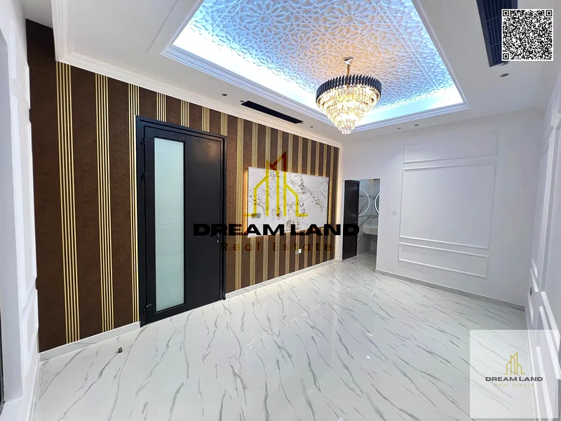 Luxury villa for sale in Al Helio 2 - Ajman | At an attractive price | 5 master bedrooms | Two-story design with a distinctive roof. Own now the villa63896736597506114