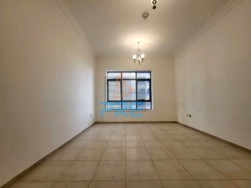 شقة غير مفروشة من غرفة نوم واحدة مع شرفة I شاغرة I 1-4 شيكات63612103270657111