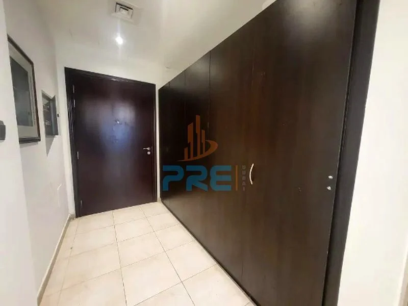 شقة غير مفروشة من غرفة نوم واحدة مع شرفة I شاغرة I 1-4 شيكات63612103270657114
